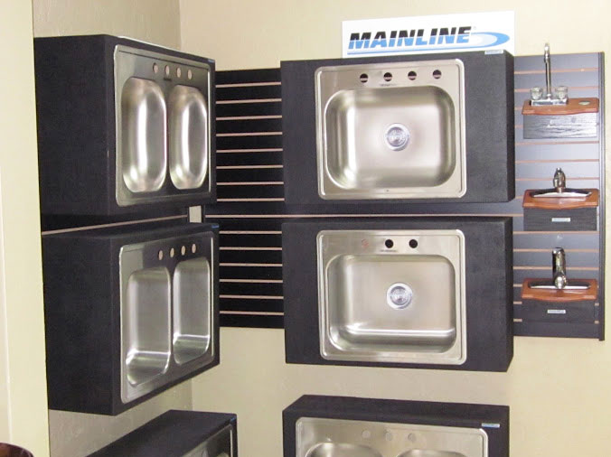 Stainless steel kitchen sinks in the Hughes Daytona plumbing showroom