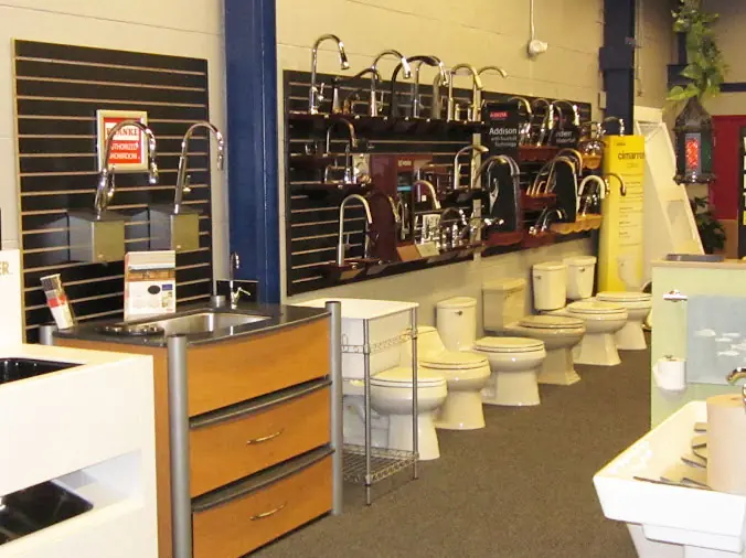 Plumbing supply showroom toilets and sink faucets at Hughes Daytona