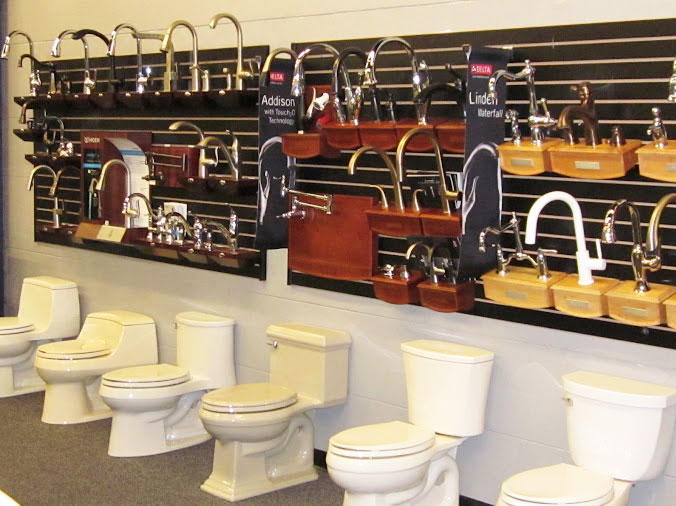 Toilets and faucets in display at Hughes Supply Daytona