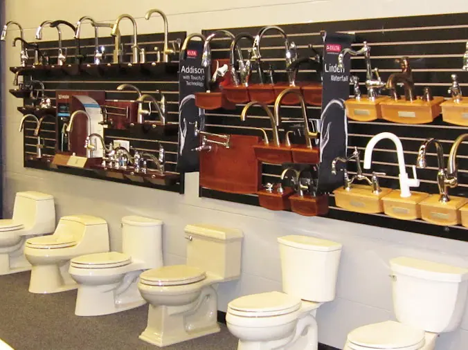 Toilets and faucets in display at Hughes Supply Daytona